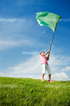 旗 振る 旗を振る の画像素材 構図 人物の写真素材ならイメージナビ